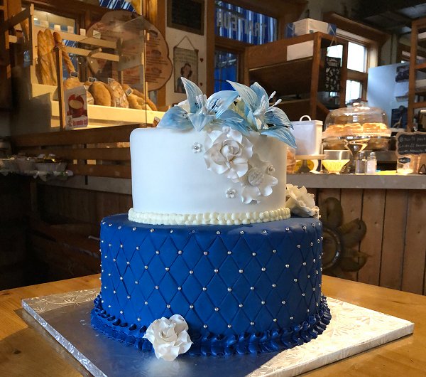 Our Daughter's Engagement Party Blue and White Cake