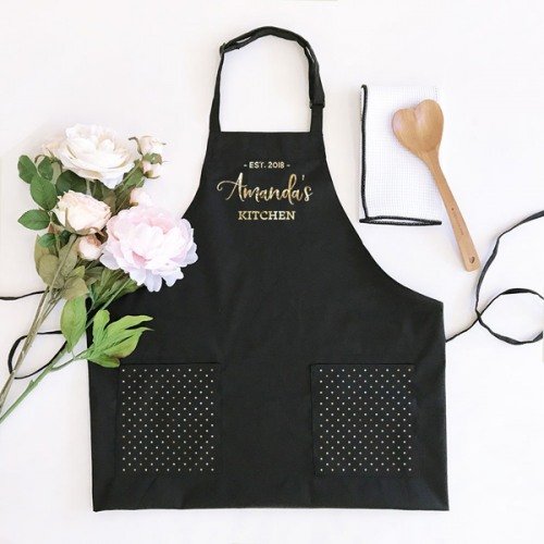 This personalized women's apron makes for a unique gift idea for a cooking bridal shower.