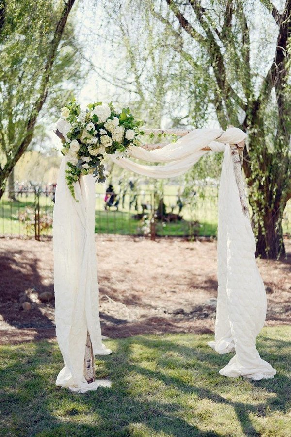 White Cheesecloth Wedding Arch Decor