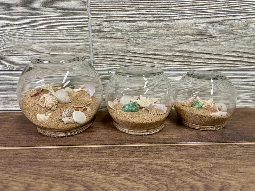 Seaside Serenity: A Coastal Grandmother Celebration Sand & Seashell Centerpieces